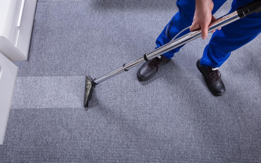 Overhead view of a steaming carpet cleaner