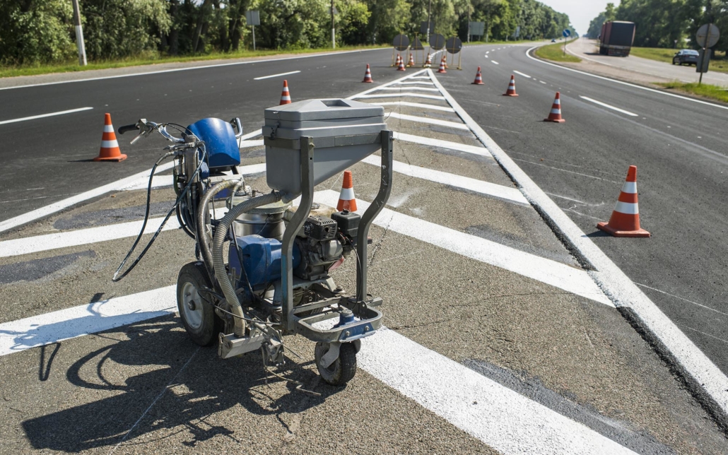 View of a road striping machine on roadway